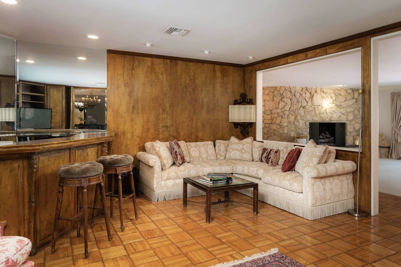 16172 Royal Oak Road — paneled den and bar